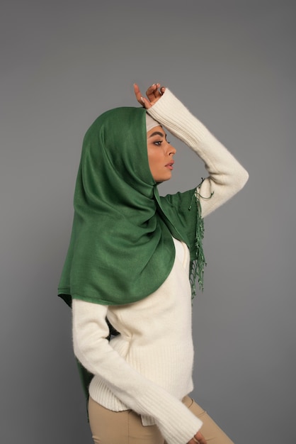 Portrait of woman wearing hijab isolated