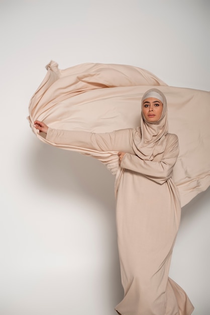 Free photo portrait of woman wearing hijab isolated