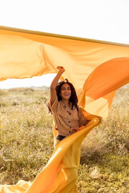 Portrait of woman with cloth in the fields