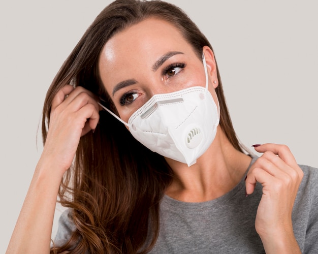 Free Photo portrait of woman with face mask concept