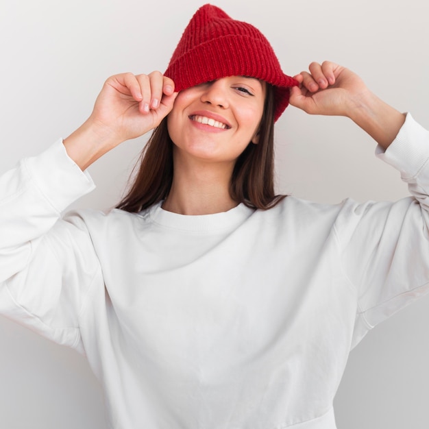 Free photo portrait of woman with hat smiling