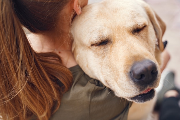 Portrait of a woman with her beautiful dog