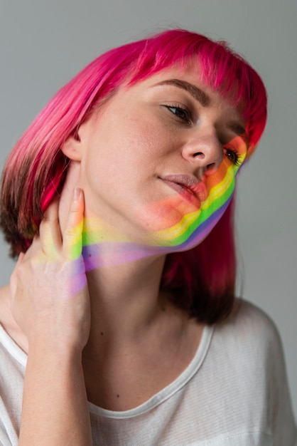 Free photo portrait of woman with lgbt symbol