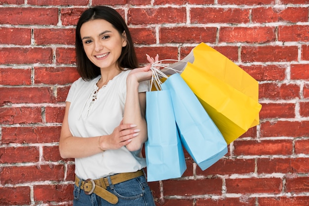 Portrait of woman with shopping bags