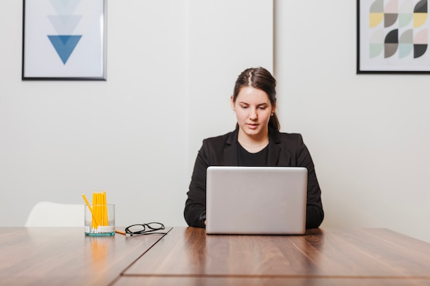 Portrait of woman working in office