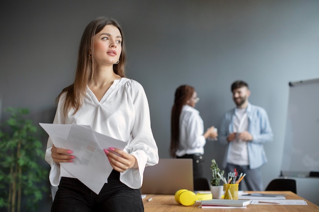 Free photo portrait of woman working in a startup company