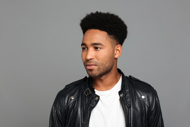 Portrait of a young afro american man in leather jacket