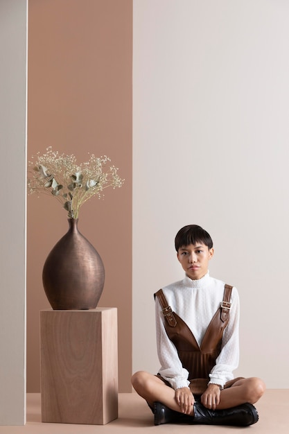 Portrait of young asian woman in autumn clothes