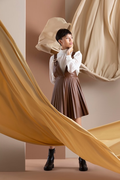 Portrait of young asian woman in autumn clothes