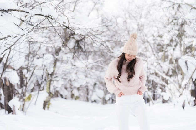 Portrait Young Beautiful asian woman smile happy travel and enjoy with snow winter season