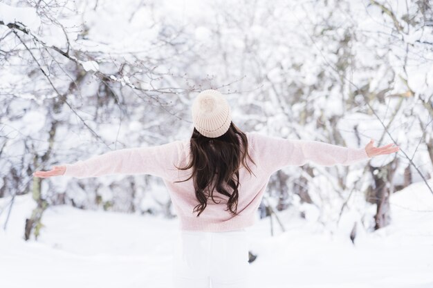 Portrait Young Beautiful asian woman smile happy travel and enjoy with snow winter season