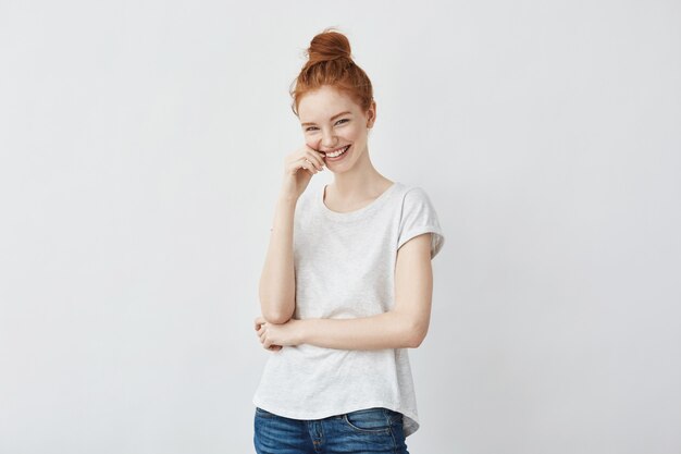 Portrait of young  beautiful redhead woman laughing.