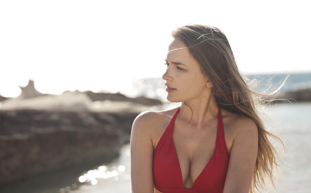 portrait of  a young beautiful woman on a beach