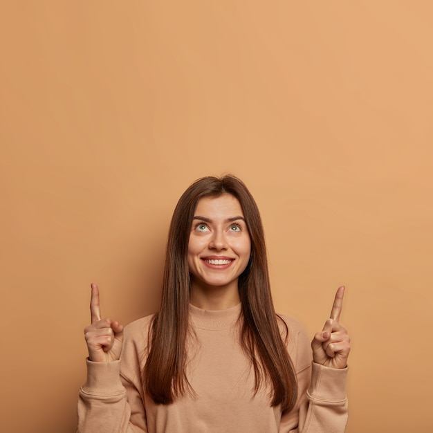 Portrait of young and beautiful woman gesticulating