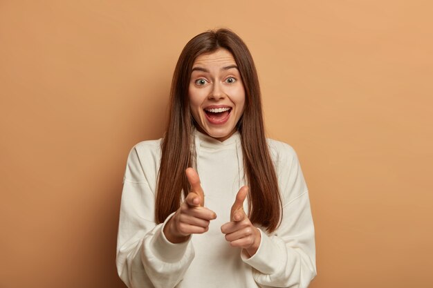 Portrait of young and beautiful woman gesticulating