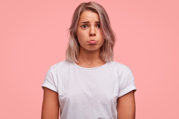 Portrait of young blonde woman