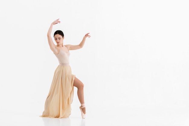 Portrait of young dancer performing ballet