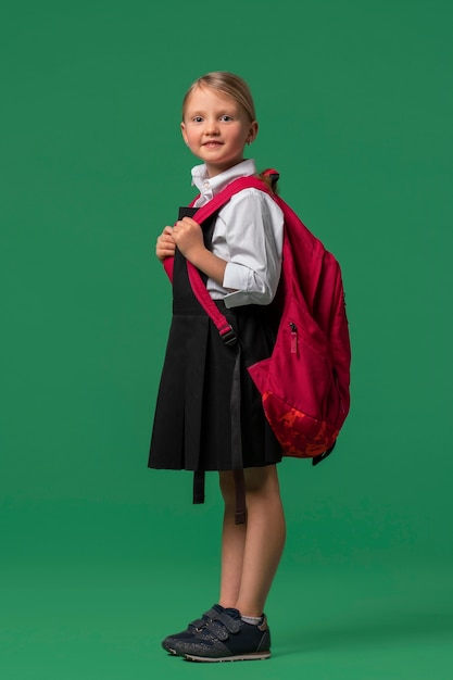 Free Photo portrait of young girl student in school uniform