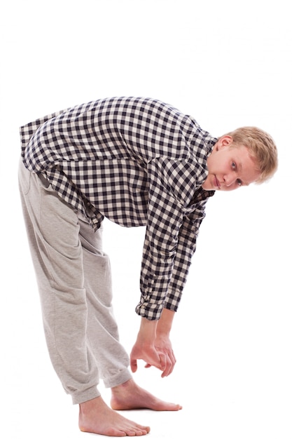 Portrait of young handsome guy exercising