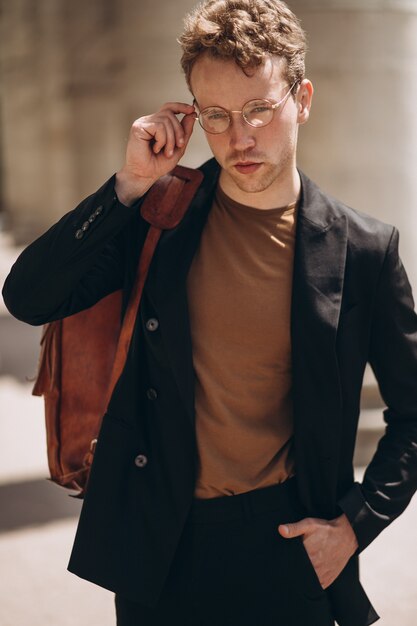 Portrait of young handsome man in spectacles