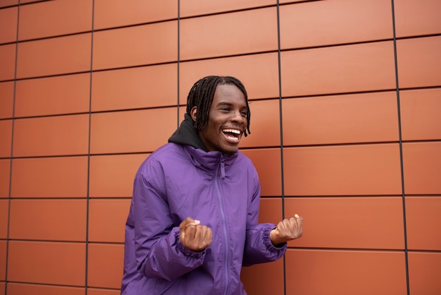 Portrait of young and happy man