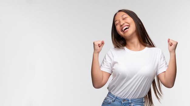 Portrait of young happy teenage girl