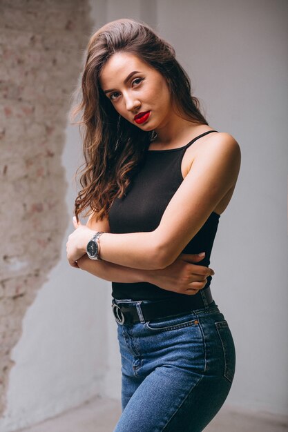 Portrait of young happy woman in studio