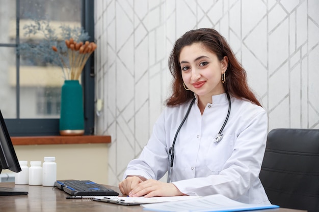 Portrait of young health care worker smiling to the camera High quality photo