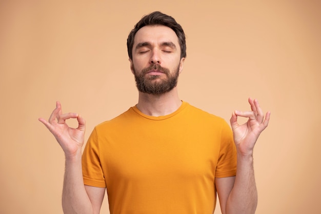 Portrait of a young man doing yoga