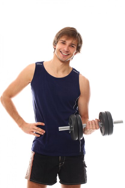 portrait young man holding a dumbbell