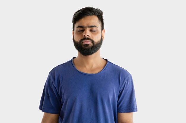 Portrait of young man isolated on white studio