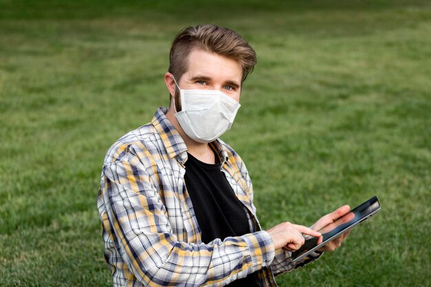 Portrait of young man wearing face mask