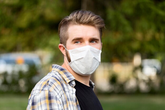 Portrait of young man wearing face mask