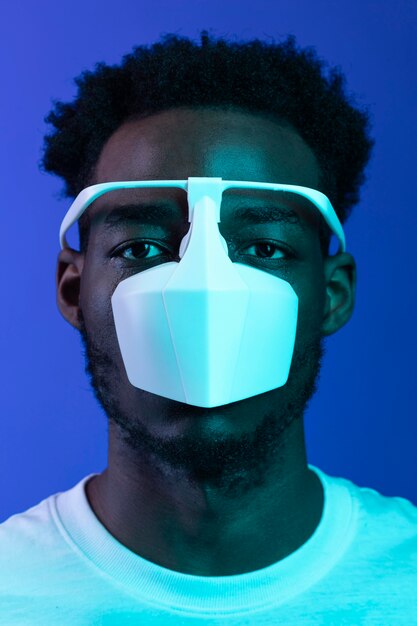 Portrait young man wearing mask