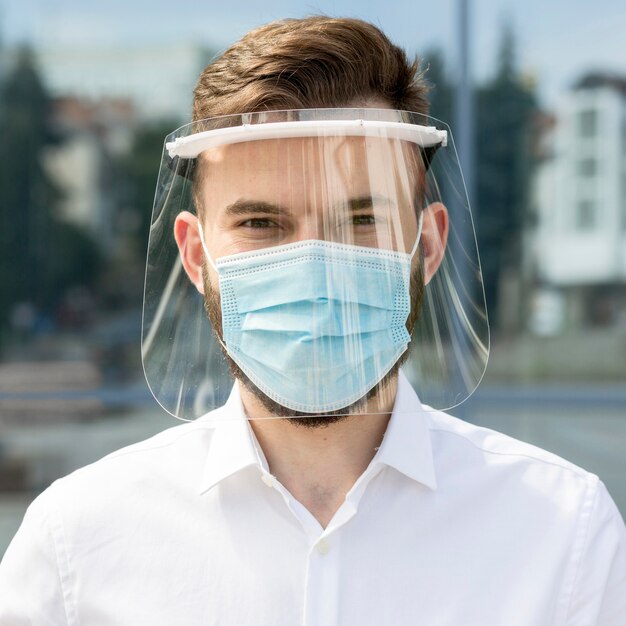 Portrait young man with mask