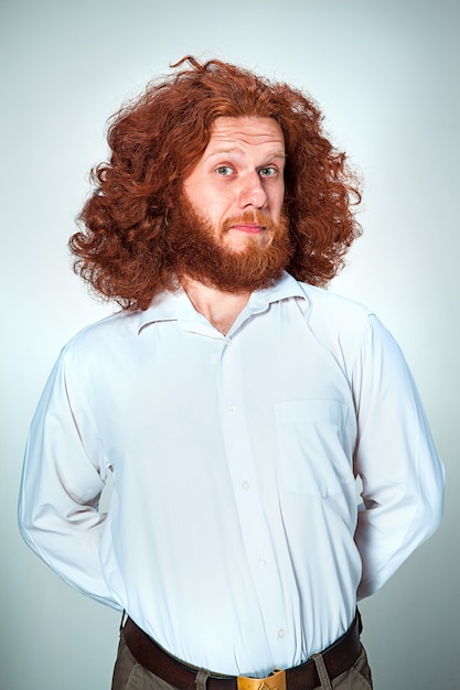 Portrait of young man with shocked facial expression