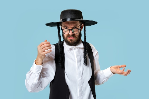 Free Photo portrait of a young orthodox jewish man during festival purim.