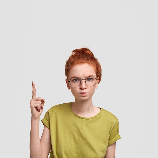 Portrait of young red-haired woman