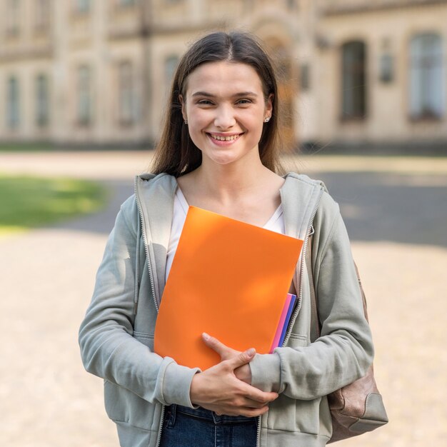 Portrait of young student happy to be back at university