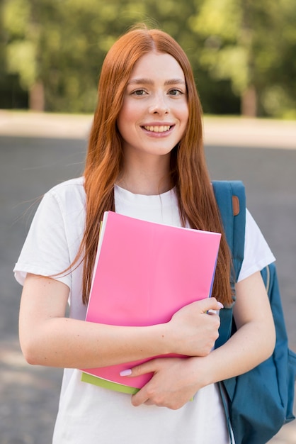 Free photo portrait of young student happy to be back at university