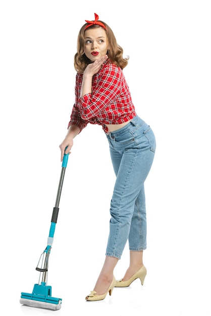 Free Photo portrait of young stylish woman with mop cleaning isolated over white background