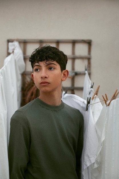 Free Photo portrait of young teenage boy outside