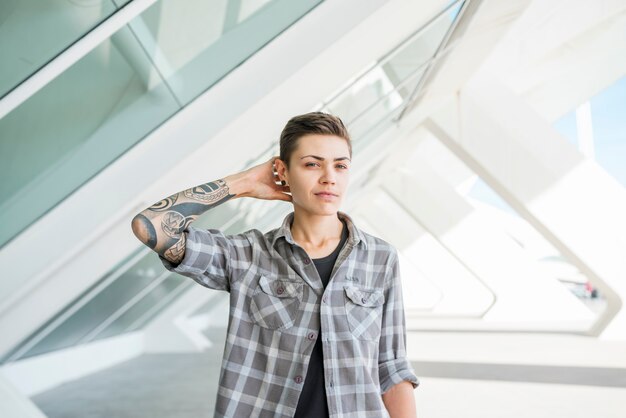 Portrait of young transgender on street