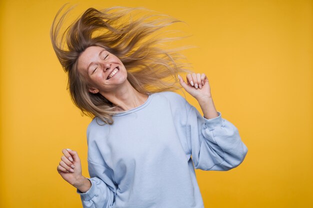 Portrait of a young woman dancing