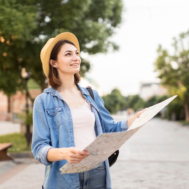 Portrait of young woman enjoying travelling