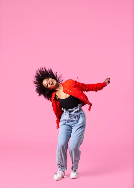 Portrait young woman jumping