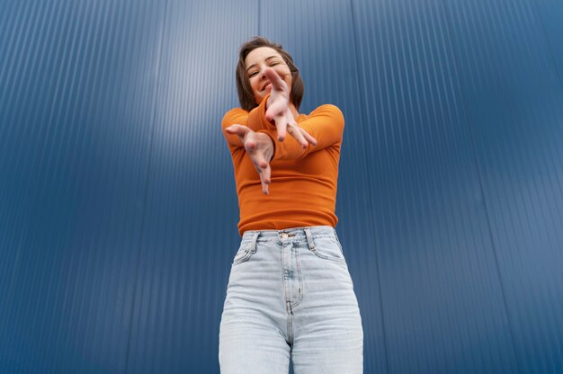 Portrait young woman jumping