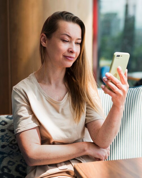 Portrait of young woman taking a selfie