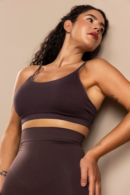 Free photo portrait of young woman wearing shapewear