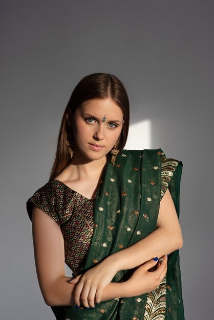 Portrait of young woman wearing traditional sari garment